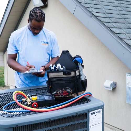 HVAC Direct technician servicing ac unit in Austin, TX